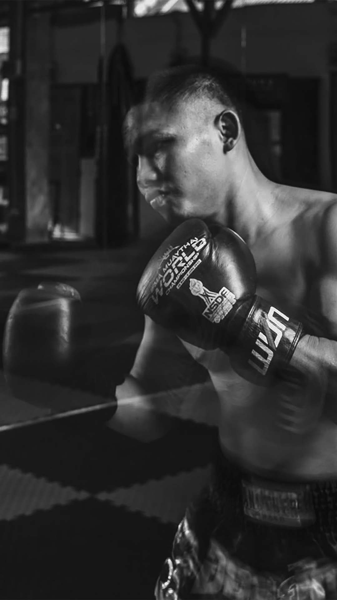 Muay Thai heavy bag training session at Rambong Muay Thai Gym in Chiang Mai