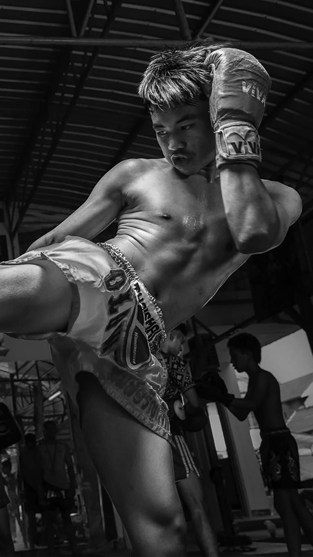 Muay Thai roundhouse kick technique being trained at Rambong Muay Thai Gym