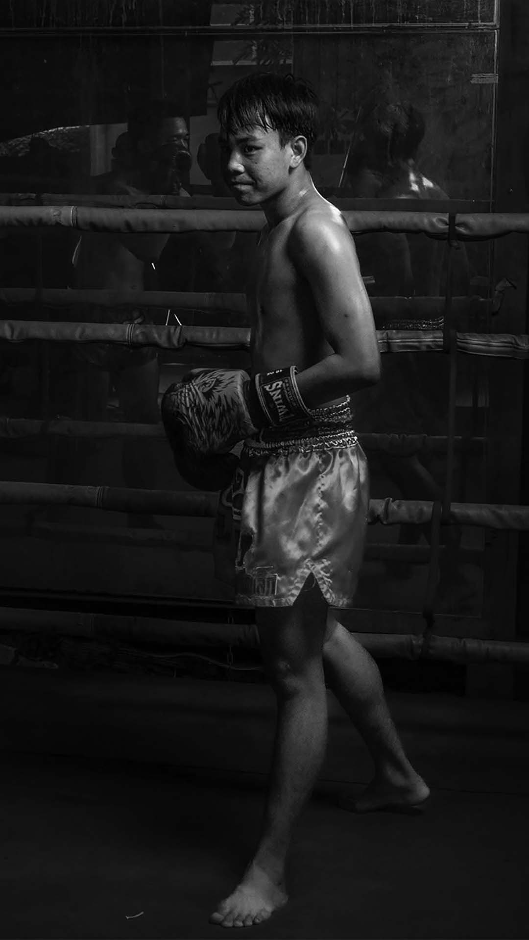 Young Muay Thai fighter training inside the ring at Rambong Muay Thai Gym