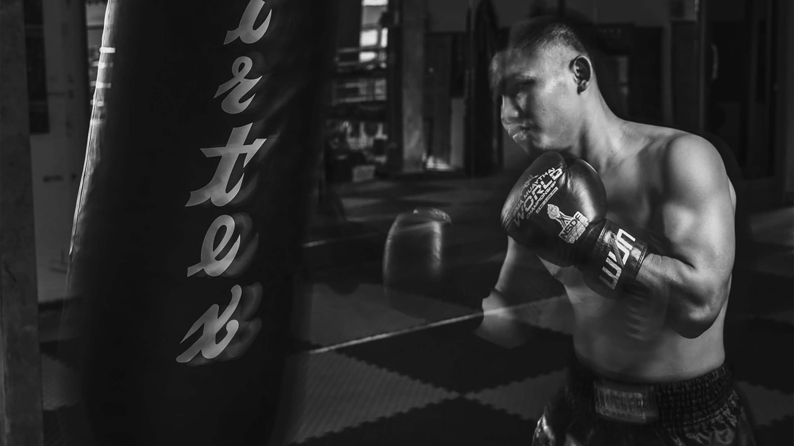 Muay Thai heavy bag training session at Rambong Muay Thai Gym in Chiang Mai