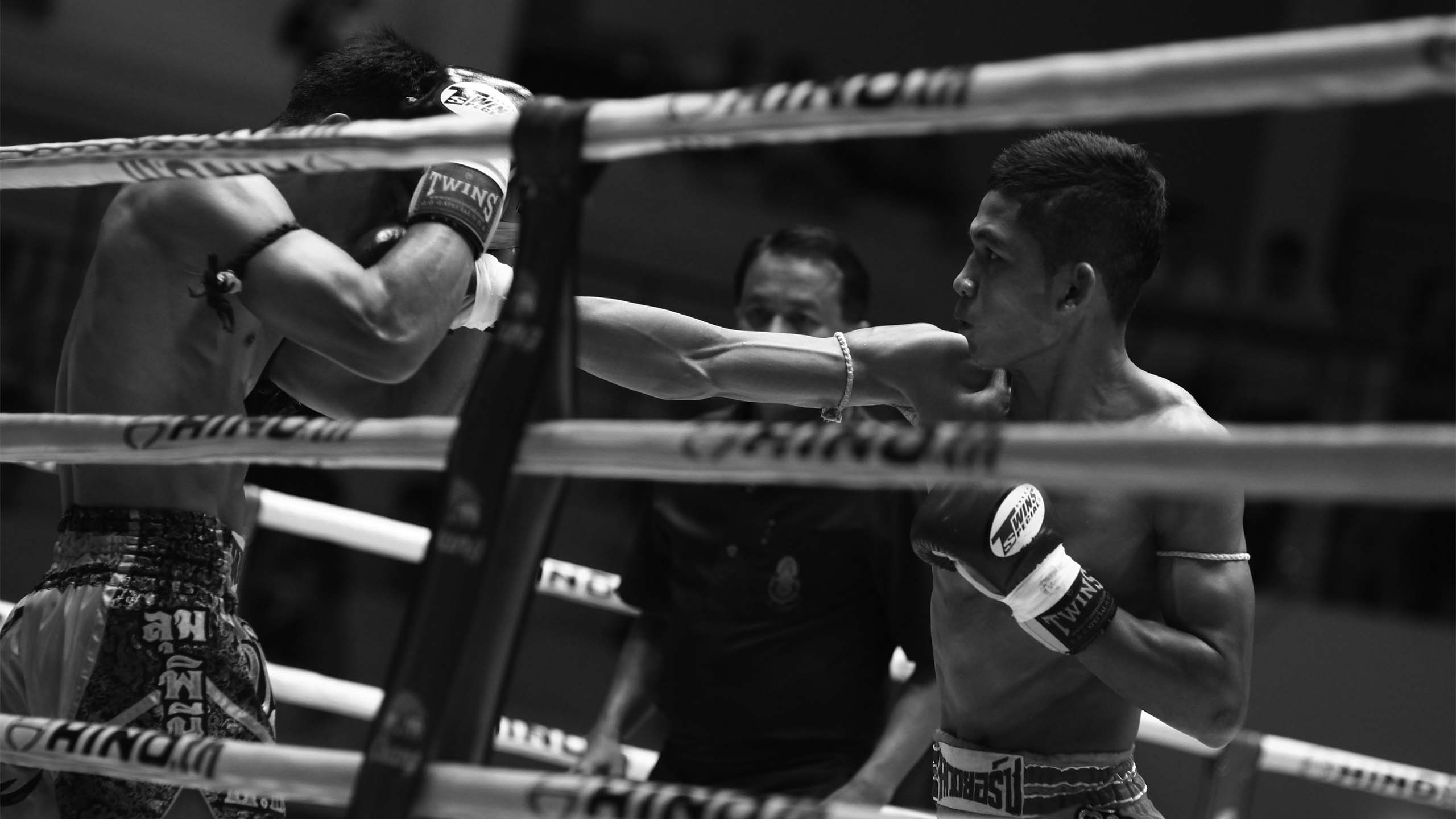 Ring action fighting in a Muay Thai stadium bout in Thailand